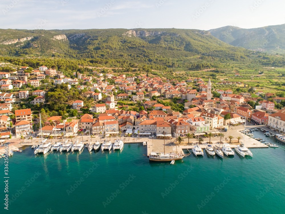 Aerial view of luxury yachts anchored at the marina in Jelsa, Croatia. Aerial view of luxury yachts anchored at the marina in Jelsa, Croatia.