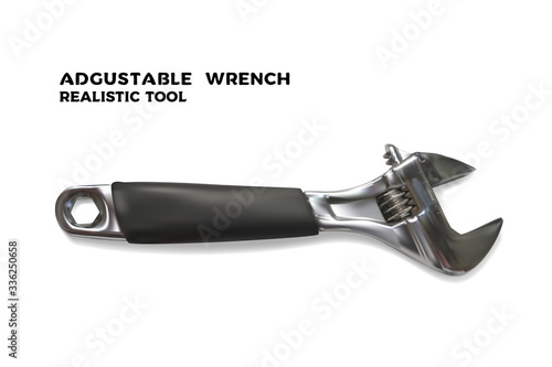 Realistic adjustable wrench. Realistic vector illustration of a hand tool on a white background. Labour day holiday design. Chrome spanner with plastic handle.