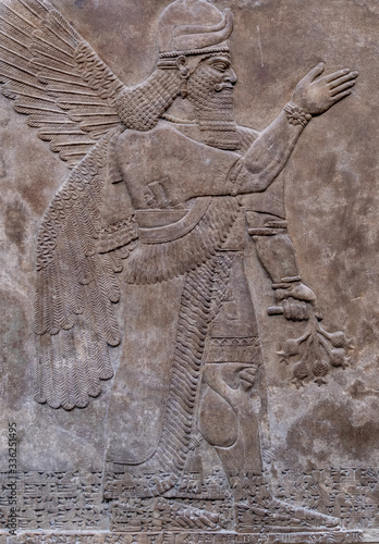 Photographie Ancient persian bas-relief depicting a winged god
