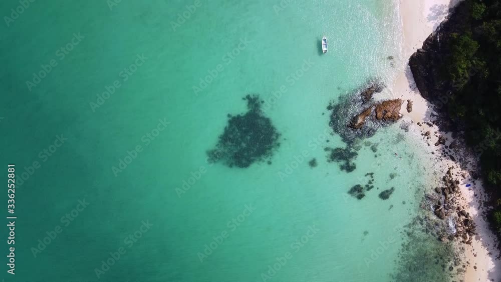 Shooting with drone, a beautiful view of the tropical beach and waves in the ocean, green islands with palm trees. Shooting with drone, a beautiful view of the tropical beach and waves in the ocean, green islands with palm trees.