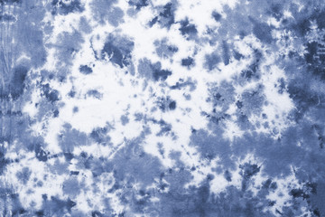 tie dye pattern hand dyed on cotton fabric abstract texture background.