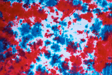 tie dye pattern hand dyed on cotton fabric abstract texture background.