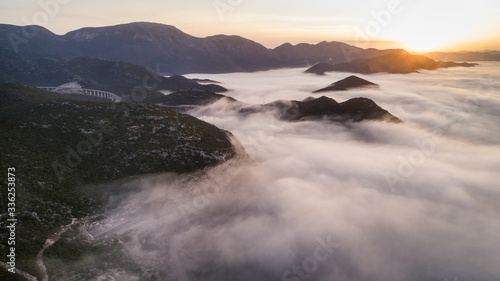 Aerial view of forggy mornin in Ploce, Dalmatia, Croatia. photo