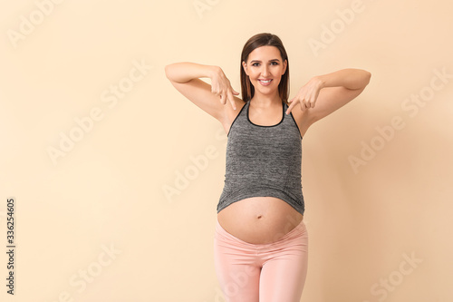 Beautiful pregnant woman on...