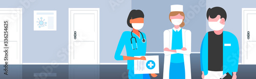 doctors team discussing during meeting in medical face masks to prevent coronavirus covid-19 disease health care safety prevention concept hospital corridor interior portrait horizontal vector