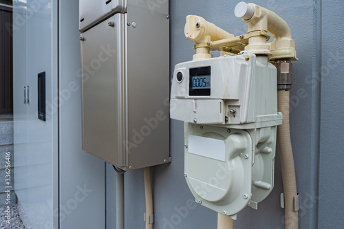 The gas meter hangs on the ...
