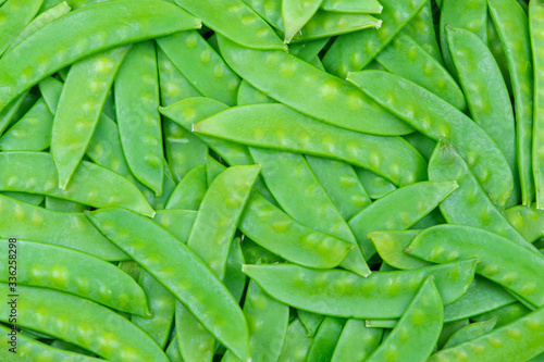 green snow pea pods background.