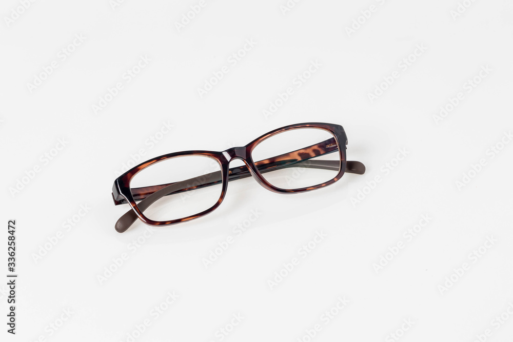 Modern eyeglass isolated on white background. single black and red eyeglasses.Glasses on white background image for background, objects and copy space. Modern eyeglass isolated on white background. single black and red eyeglasses.Glasses on white background image for background, objects and copy space.
