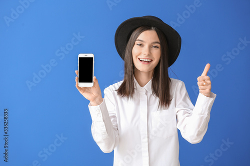 Beautiful young woman with ...