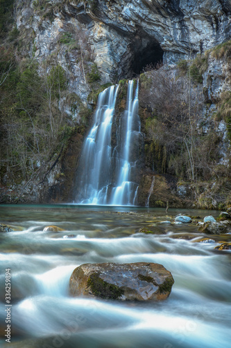 waterfall coming out of a cave, Pyrenees, Laruns 64440 Pyrénées-Atlantiques France, fine art landscape, long exposure photography 