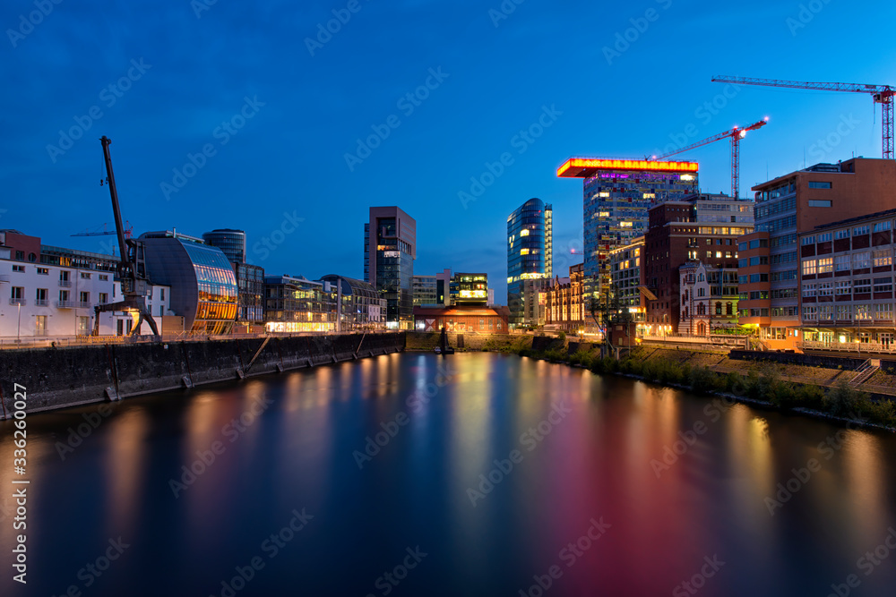 Dusseldorf cityscape with view on media harbor, night view Dusseldorf cityscape with view on media harbor, Germany