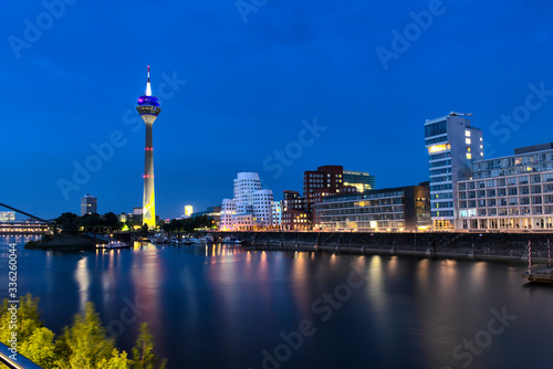 Dusseldorf cityscape with view on media harbor, night view Dusseldorf cityscape with view on media harbor, Germany