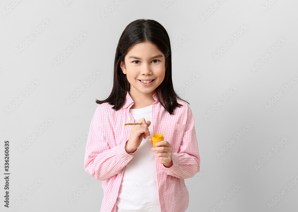Cute little artist on light background Cute little artist on light background