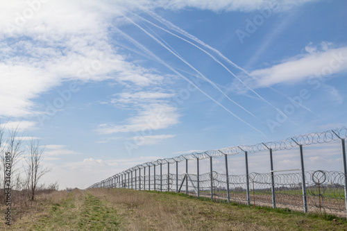 Border fence between Rastina (Serbia) & Bacsszentgyorgy (Hungary). This border wall was built in 2015 to stop the incoming refugees & migrants during the refugees crisis, on Balkans Route.