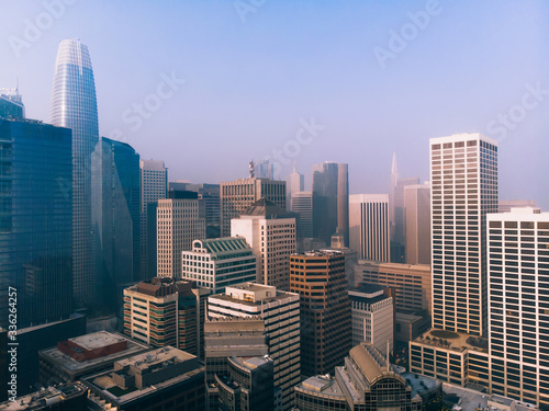 Cityscape view of midtown of megapolis with commercial real estate and apartments, panorama of modern city with high architectural buildings and skyscraper in financial business district with offices