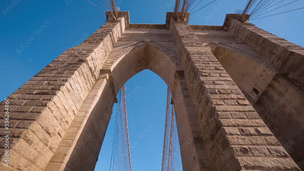 Fototapeta premium Ancient Brooklyn Bridge in New York - famous landmark