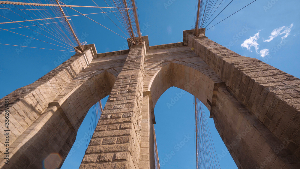 Obraz premium Ancient Brooklyn Bridge in New York - famous landmark