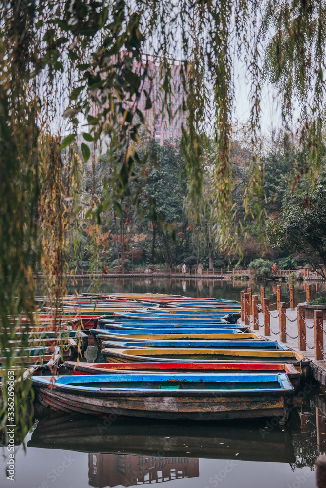 colorful small boats docked on the river in China