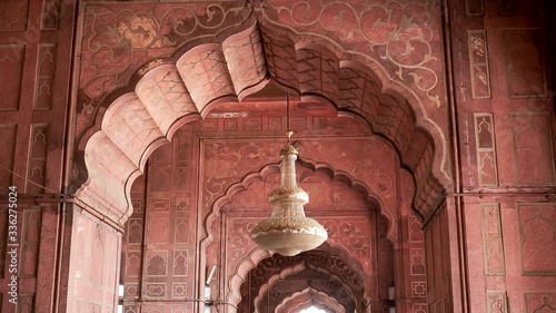 a jama masjid chandelier and arches in the old city of delhi photo