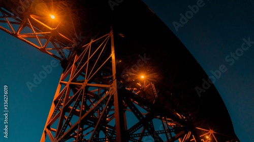 Design and structure under San Francisco Golden Gate Bridge. Natural blue lighting sunset background.
