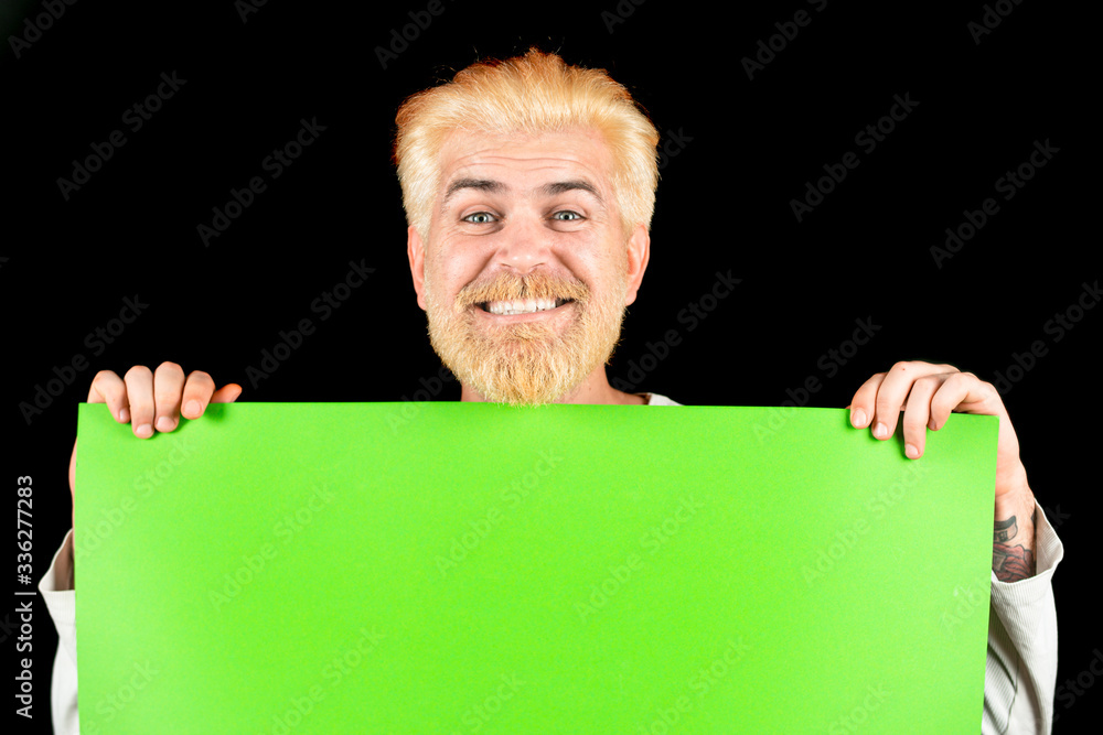 Portrait of man holding sign card. Presentation. Season sales. Blank, empty paper, billboard with copy space for text. Portrait of man holding sign card. Presentation. Season sales. Blank, empty paper, billboard with copy space for text.
