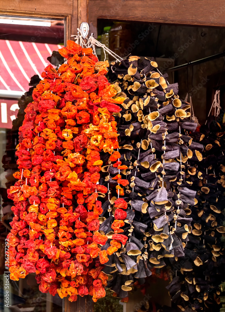 Dried Eggplants, Peppers and Other Dried Vegetables Hanging on a String at bazaar in Ankara Turkey
