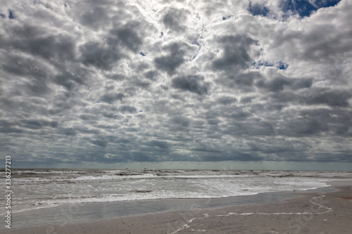 Photo of the surf and amazing broken clouds at the beach at Talbot Island, FL
