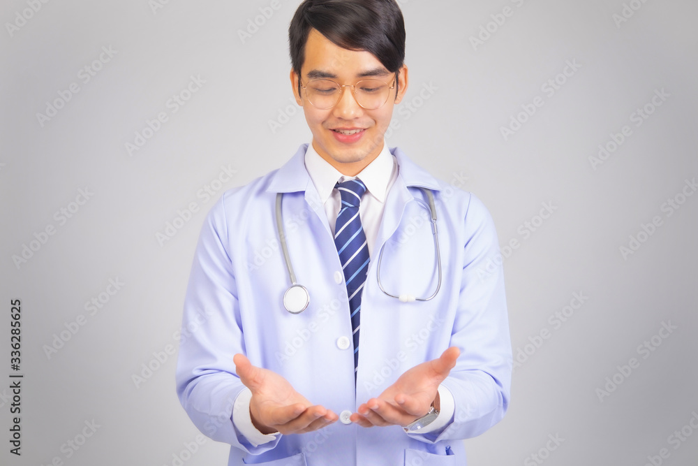 portrait medical doctor in white uniform on gray background, medical concept portrait medical doctor in white uniform on gray background, medical concept