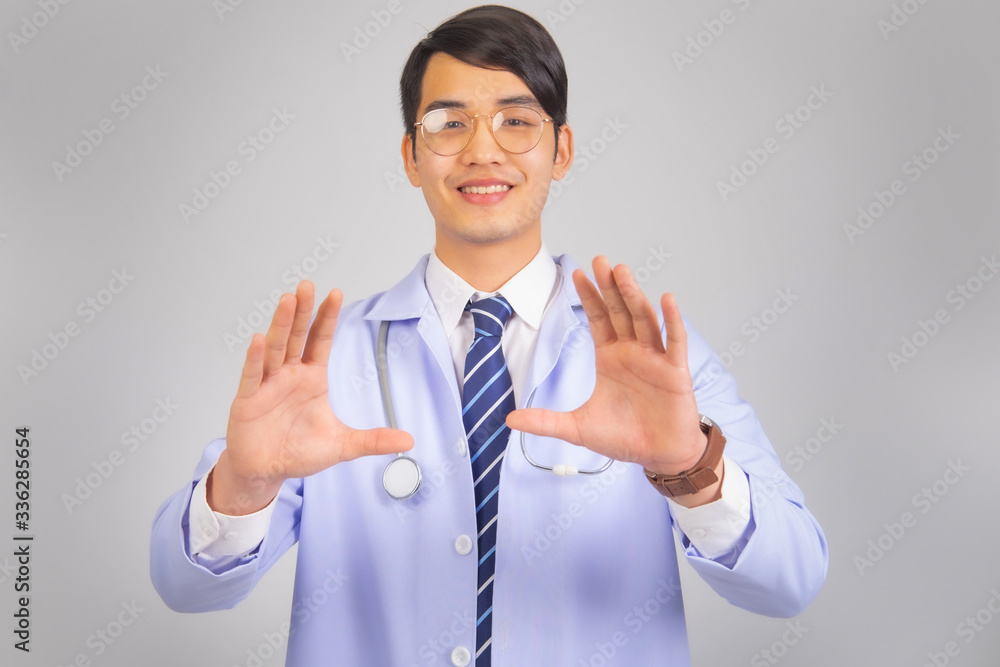 portrait medical doctor in white uniform on gray background, medical concept portrait medical doctor in white uniform on gray background, medical concept