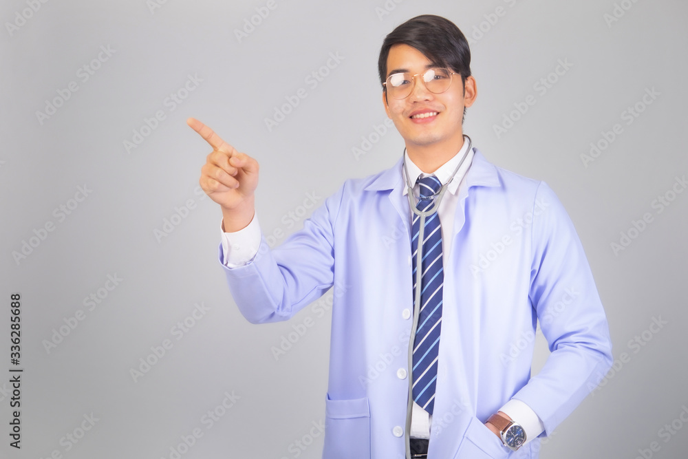 portrait medical doctor in white uniform on gray background, medical concept portrait medical doctor in white uniform on gray background, medical concept