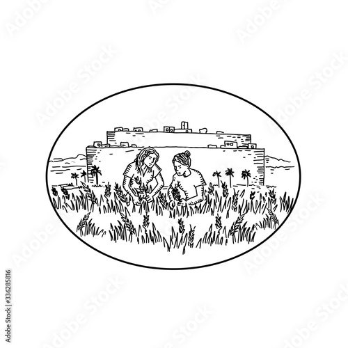 Retro style illustration of two women gathering or harvesting wheat in farm outside a walled city set inside oval shape on isolated background done in black and white.