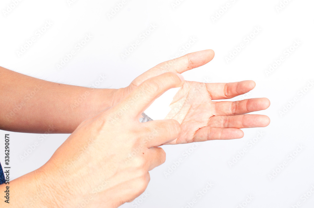 Closeup of hands washing with Alcohol sanitize solution on white backgrounds for cleanning body part