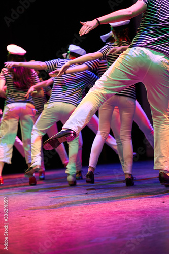 Tap dancing sailors on stage