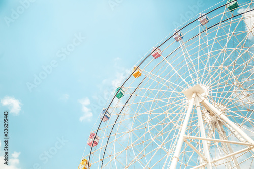 Ferris wheel and blue sky.