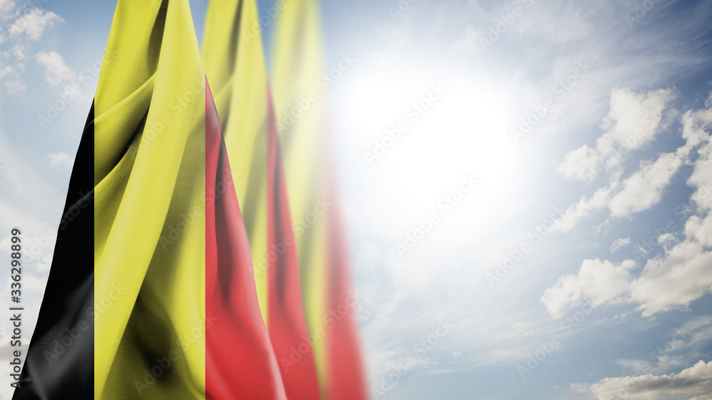 Close up waving flag of Belgium. National Belgium flag in the sky.
