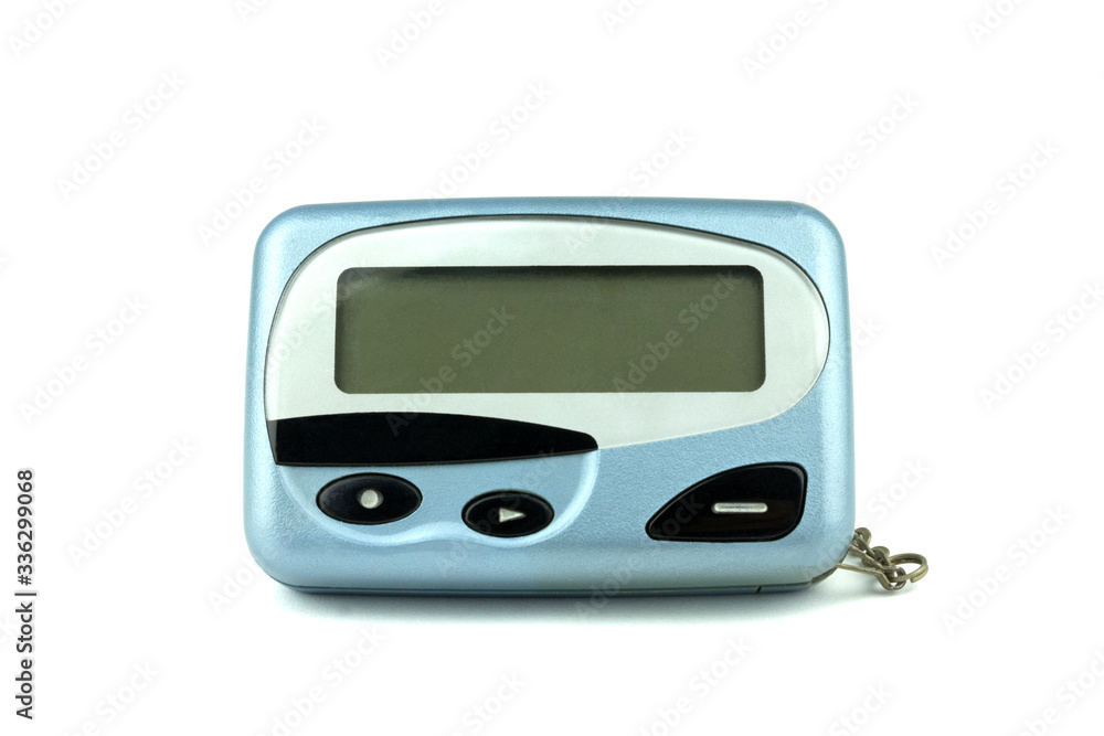 Close-up front old a cyan metallic pager or beeper isolated with clipping path on white background. Close-up front old a cyan metallic pager or beeper isolated with clipping path on white background.