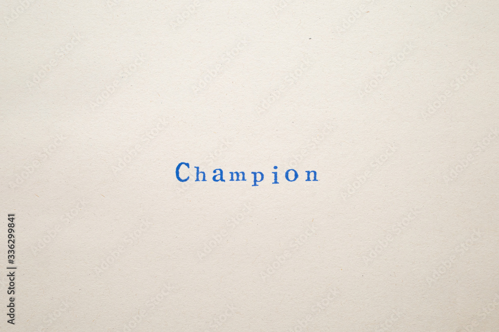 a CHAMPION word stamped on a piece of paper.