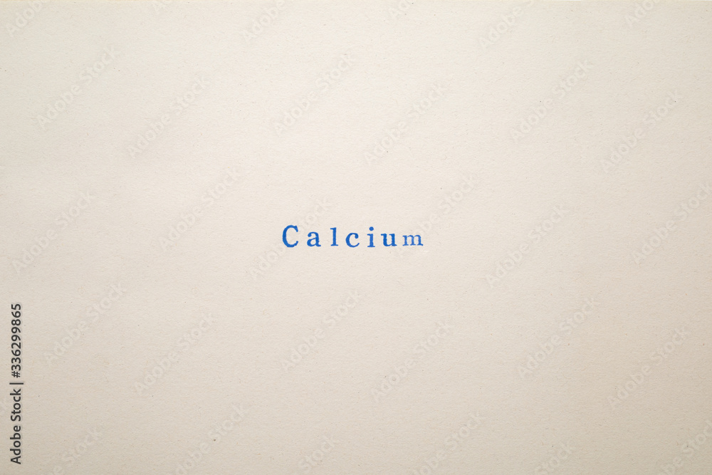 a CALCIUM word stamped on a piece of paper. a CALCIUM word stamped on a piece of paper.