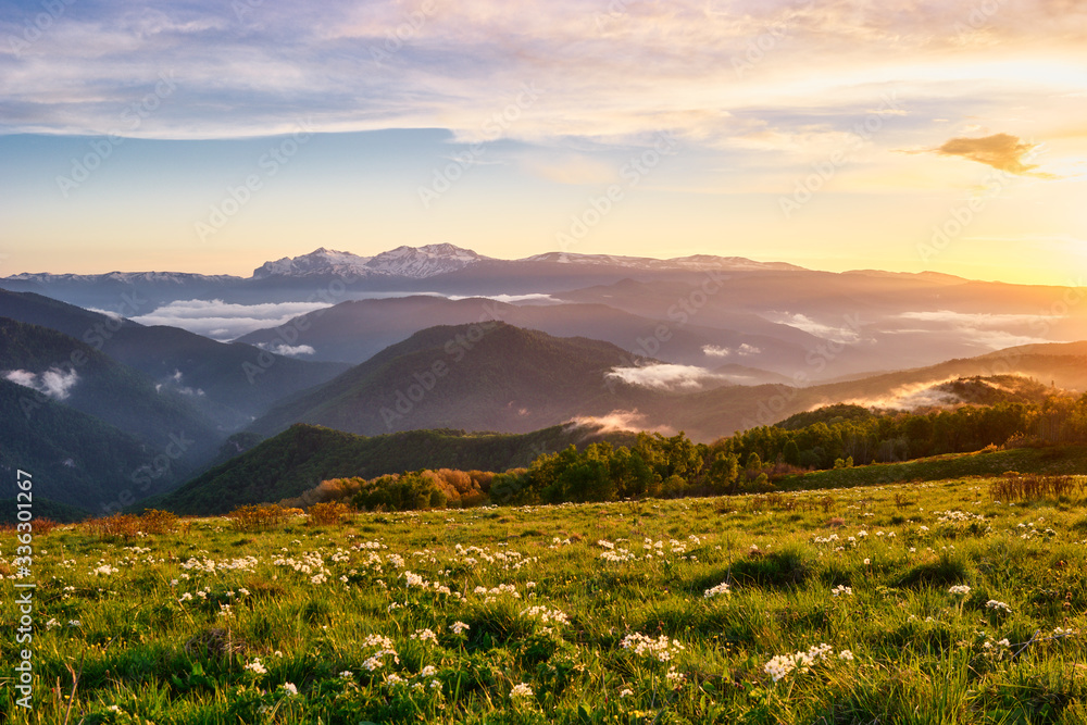 Mountain valley during bright sunrise. Beautiful natural landscape. Adygea, do-do-gush. Beautiful natural landscape.