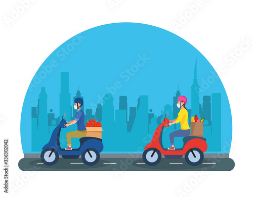 couple in motorcycle using face masks transport groceries and apples © Jemastock