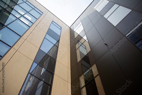 Abstract texture and blue glass facade in modern office building. 