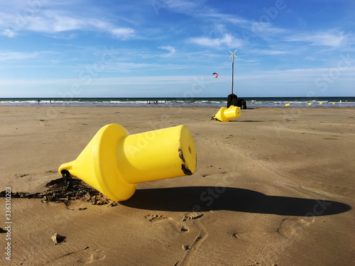 Yellow buoy on the Omaha beach