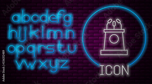 Glowing neon line Stage stand or debate podium rostrum icon isolated on brick wall background. Conference speech tribune. Neon light alphabet. Vector Illustration