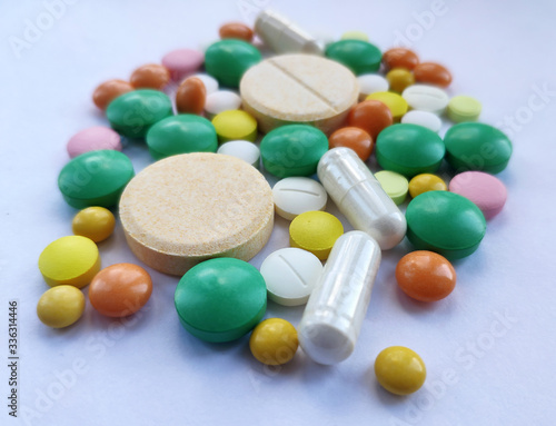 Colourful pills set, medicine background