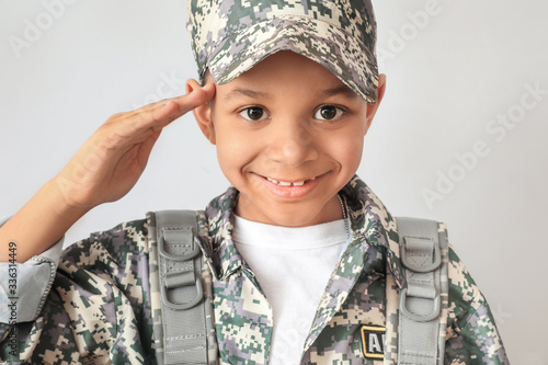 Little saluting African-Ame...