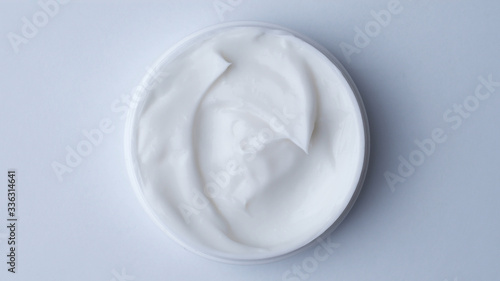 Close up shot of cosmetics cream. Top view