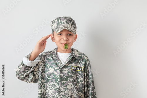 Little saluting African-Ame...