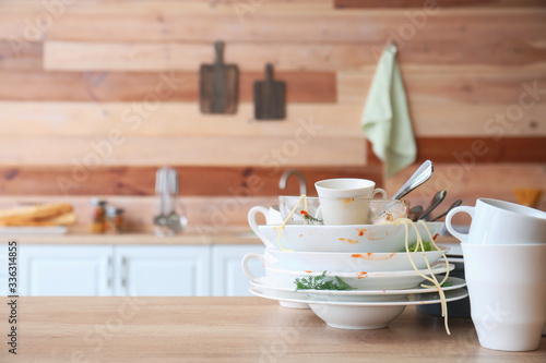 Many dirty dishes on kitche...