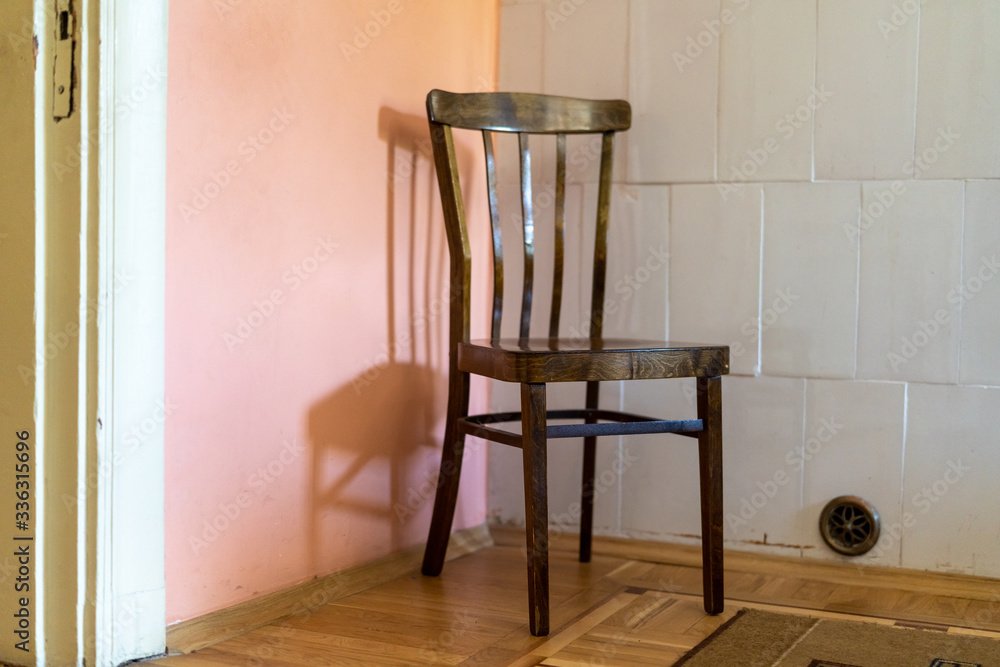 Fototapeta premium antique chair in the old interior