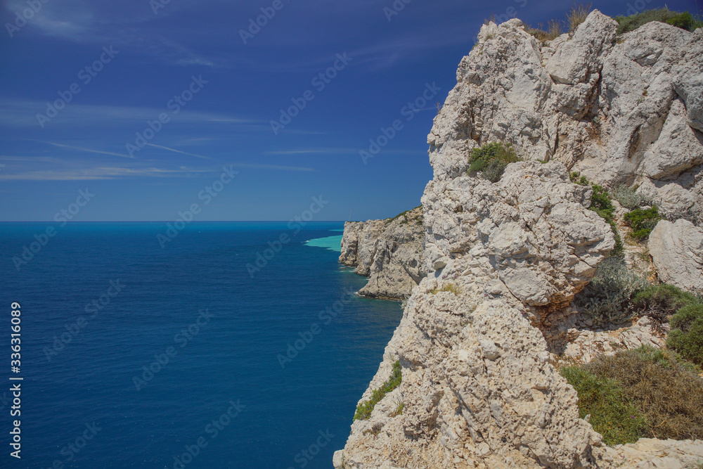 Rocky coast of the Mediterranean sea and water surface